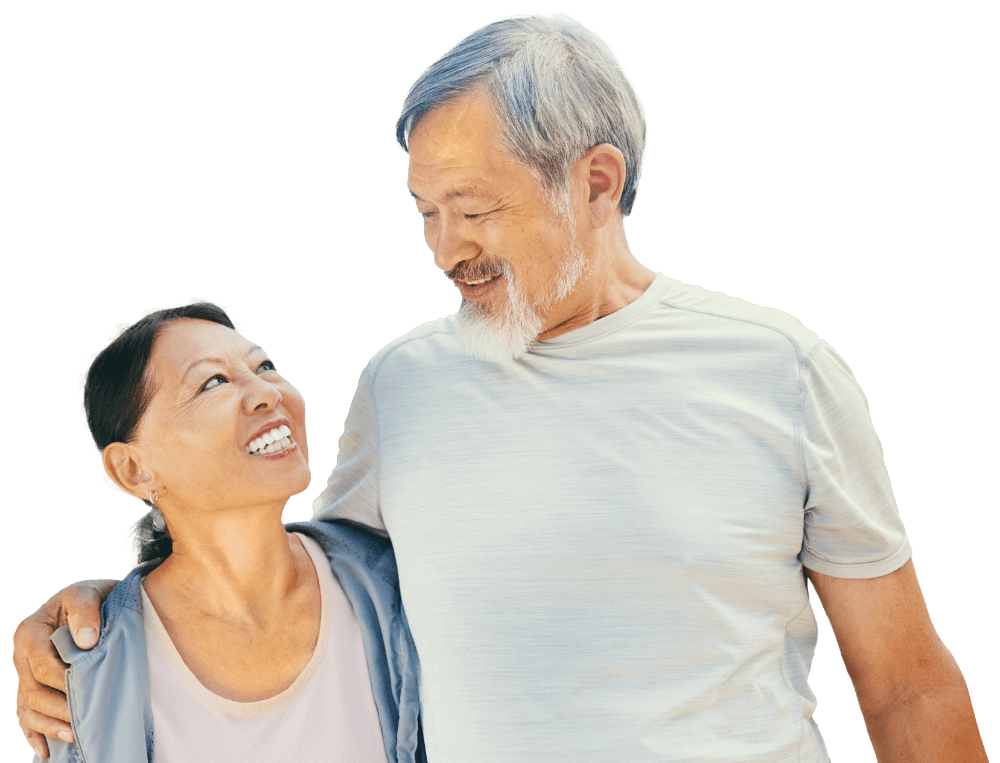 An older couple laughing together.