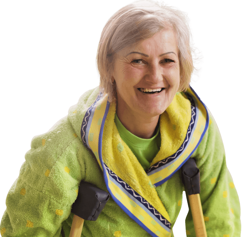 A woman with crutches and a smile get benefit from plant medicine